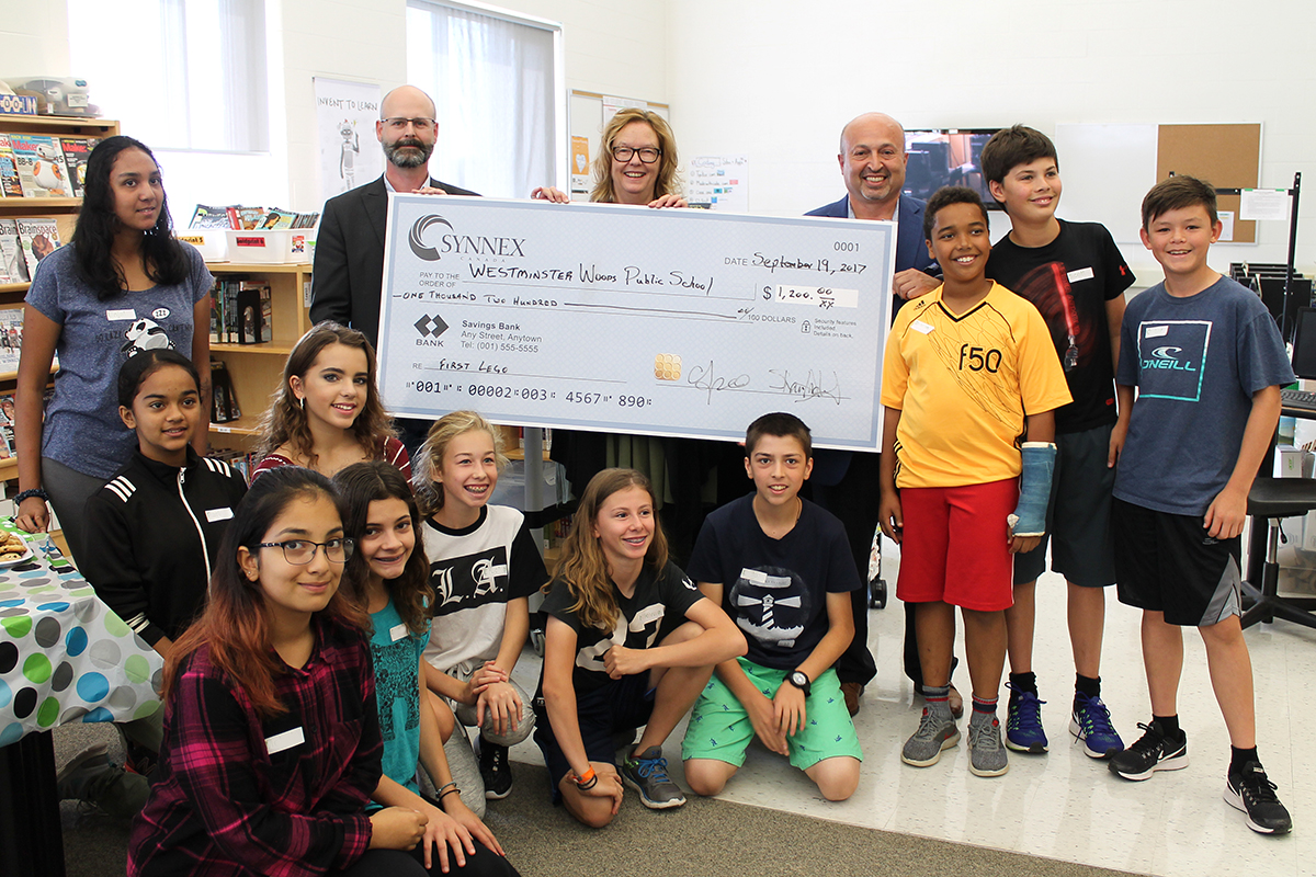 On Sept. 19, 2017, representatives from Synnex Canada were at Westminster Woods Public School to present a cheque for $1,200 to the school so that teams can compete in the FIRST LEGO League Challenge.