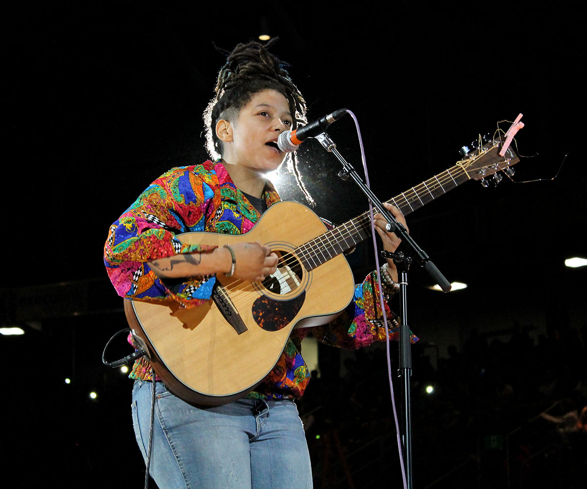 Singer-songwriter NEFE performs at Empowerment Day 2018.