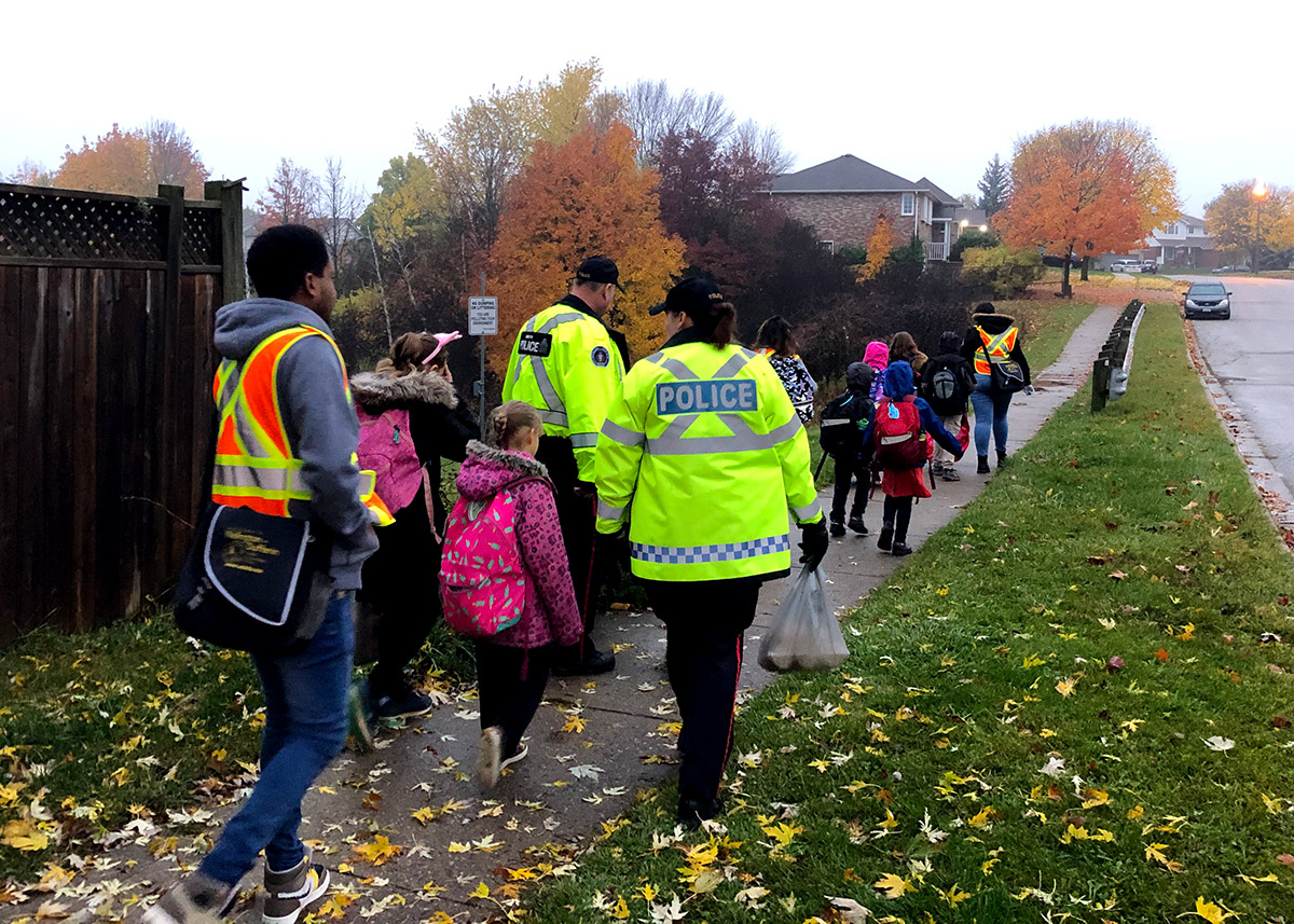 Mitchell Woods PS students take part in the Walking School Bus pilot program on Oct. 31, 2019.