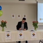 UGDSB's Brent McDonald signs the VTRA protocol on April 20, 2023.