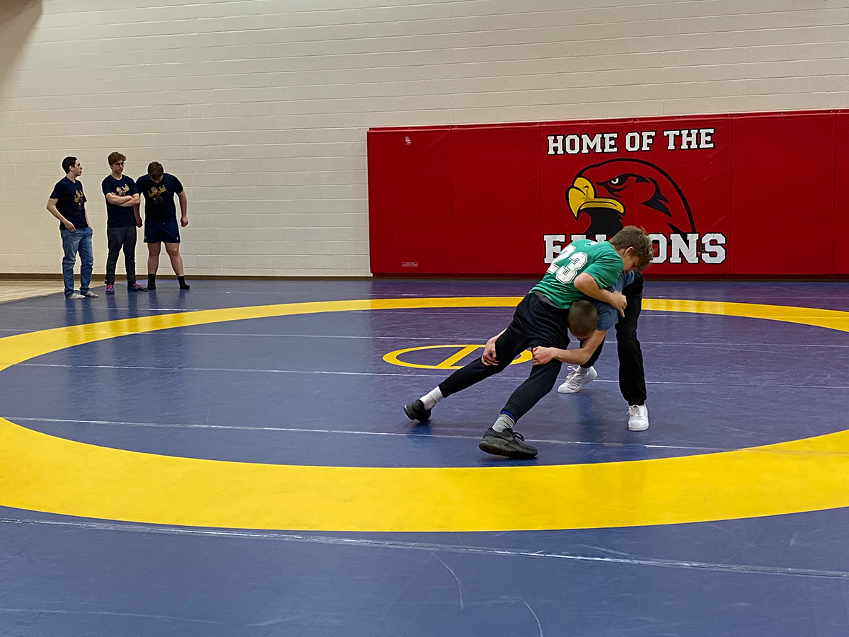 Two students wrestle on the mat at the annual CWDHS elementary wrestling tournament.